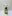 White spray bottle with a green label reading 'Vibes' and leaf imagery.