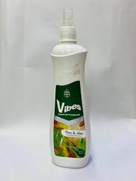 White spray bottle with a green label reading 'Vibes' and leaf imagery.